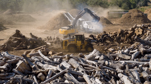 Wood waste grinding
